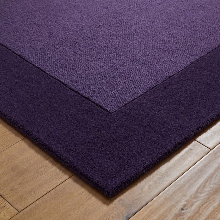 Colours Bordered Wool Rug in Purple