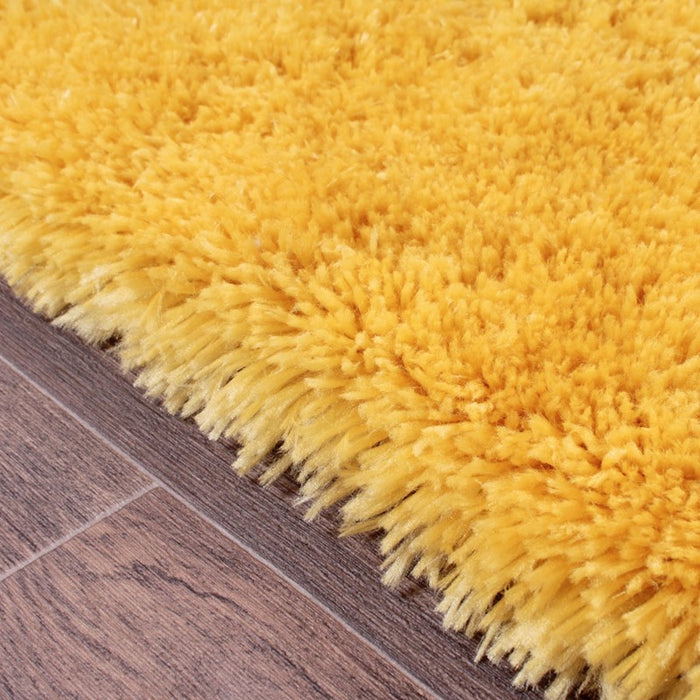 Urco Flossy Plain Shaggy Rugs in Gold Yellow